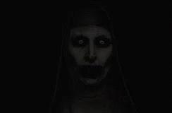 A scary horror-film nun face